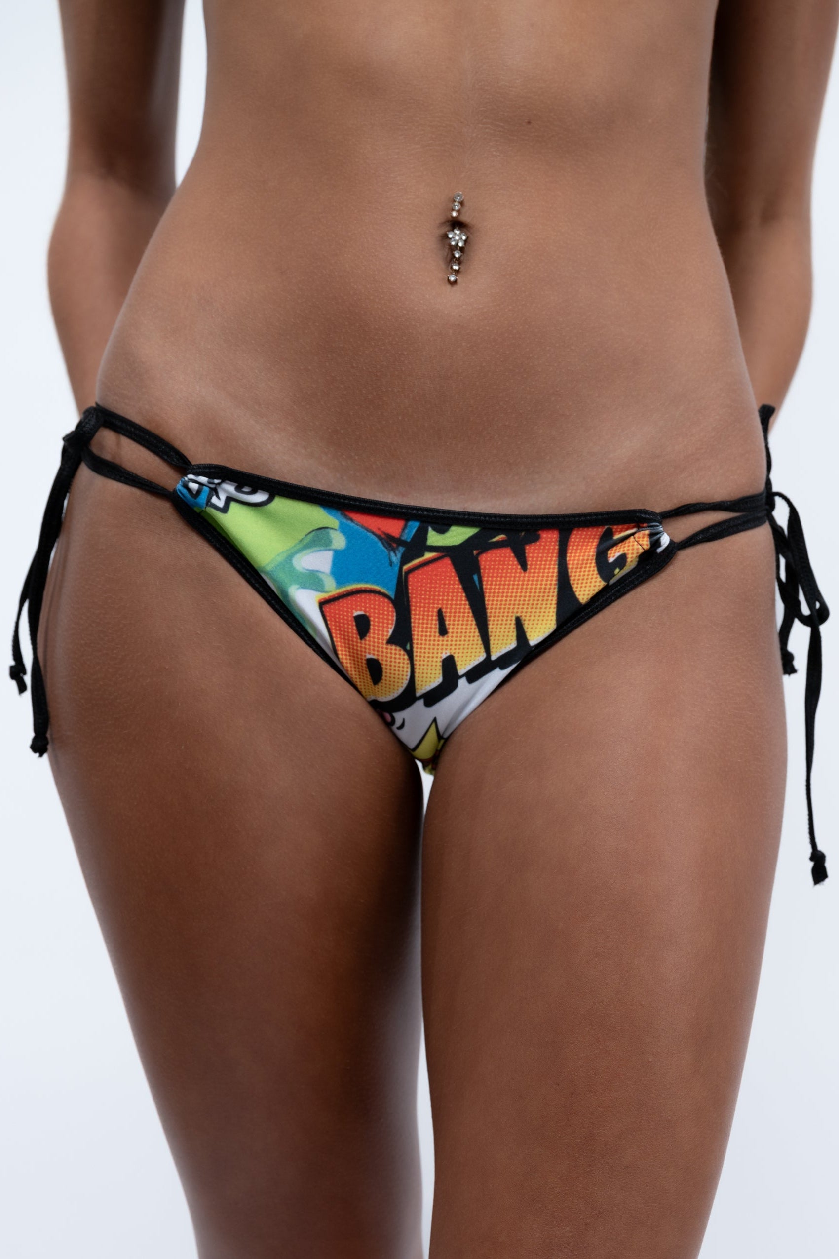 Colorful bikini bottom with 'BANG' text on a white background